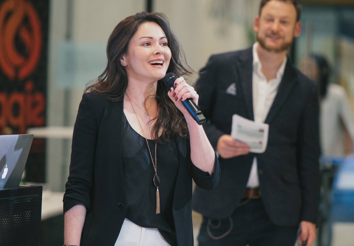 A Founders Network member speaking at an event